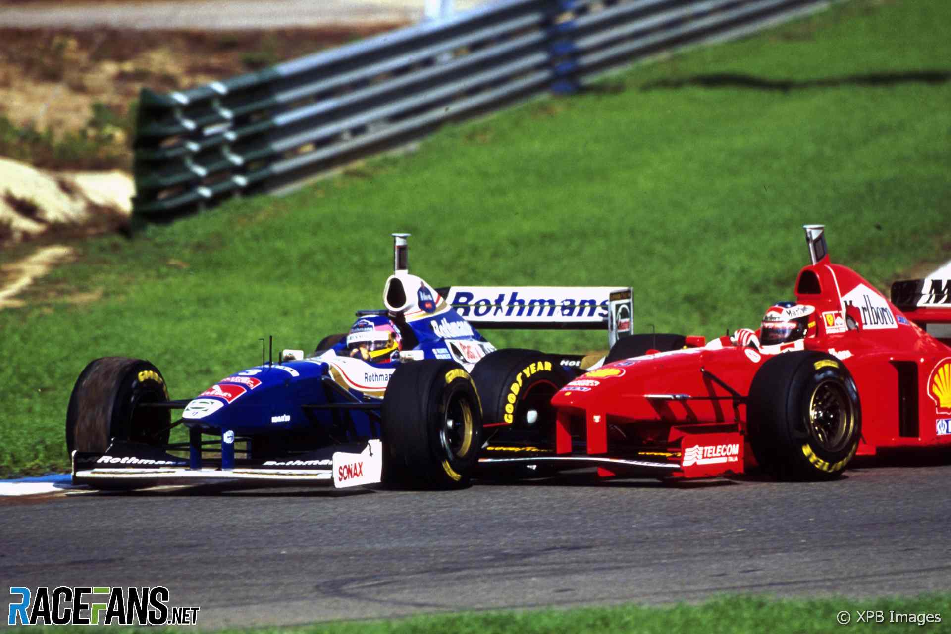 Michael Schumacher collides with Jacques Villeneuve