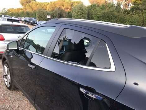 Several cars were broken into and damaged