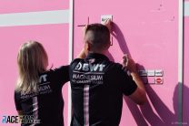 Force India personnel remove sponsors, Spa, 2018