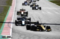 Latifi extends championship lead by passing Zhou to win
