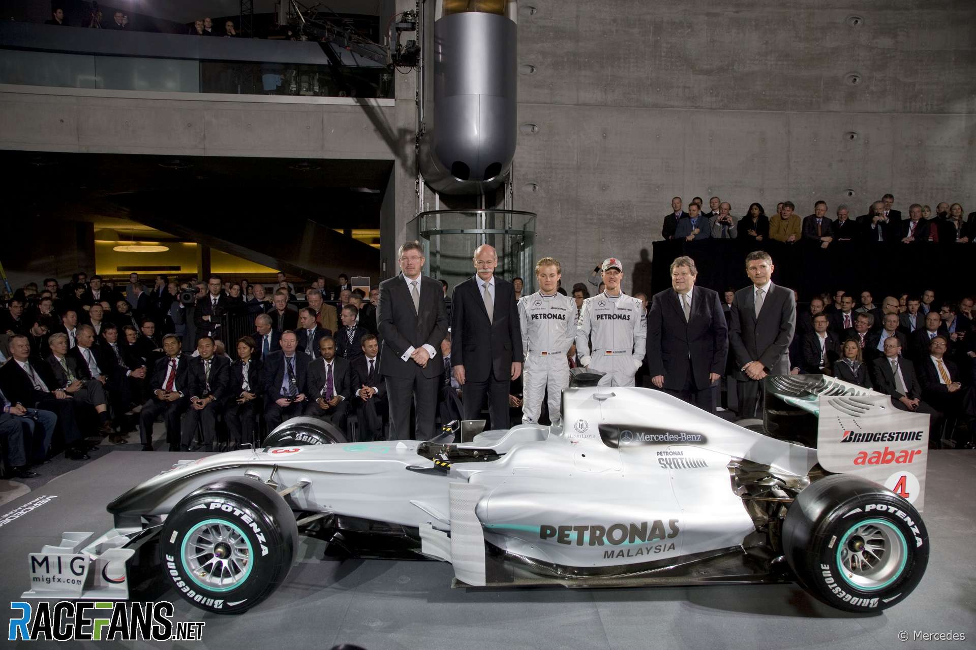 Ross Brawn, Dieter Zetsche, Nico Rosberg, Michael Schumacher, Norbert Haug and Nick Fry at the launch of the Mercedes W01, 2010