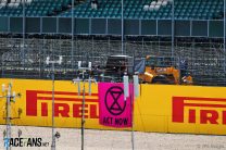 Four arrested after Extinction Rebellion banner appears in F1 broadcast