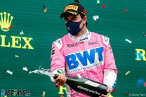 Sergio Perez, Racing Point, 2nd position, on the podium spraying champagne