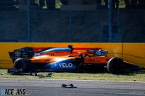 Carlos Sainz, McLaren MCL35, crashes out