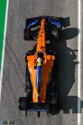 Lando Norris, McLaren MCL35, overhead angle in the pit lane