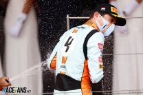 Lando Norris, McLaren, 3rd position, celebrates on the podium