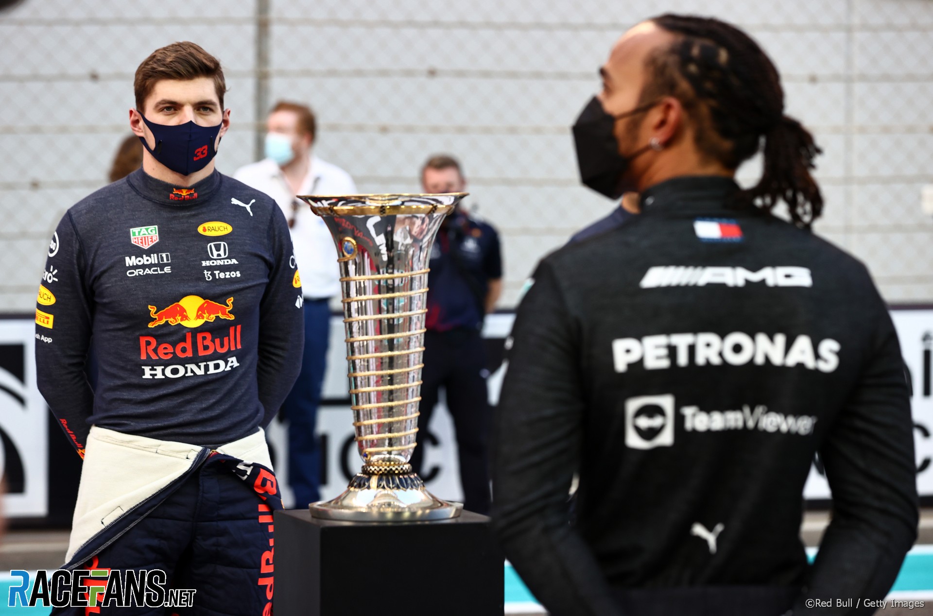 Max Verstappen, Lewis Hamilton and the World Drivers' Championship trophy, Yas Marina, Abu Dhabi, 2021