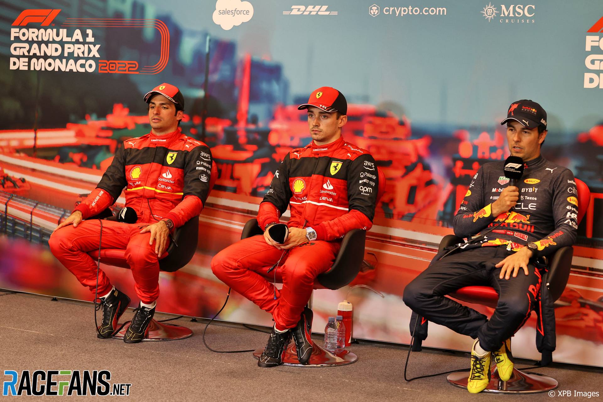 (L to R): Carlos Sainz Jr, Charles Leclerc, Ferrari; Sergio Perez, Red Bull; Monaco, 2022