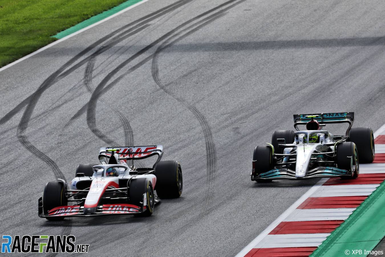 (L to R): Mick Schumacher, Haas; Lewis Hamilton, Mercedes; Red Bull Ring, 2022