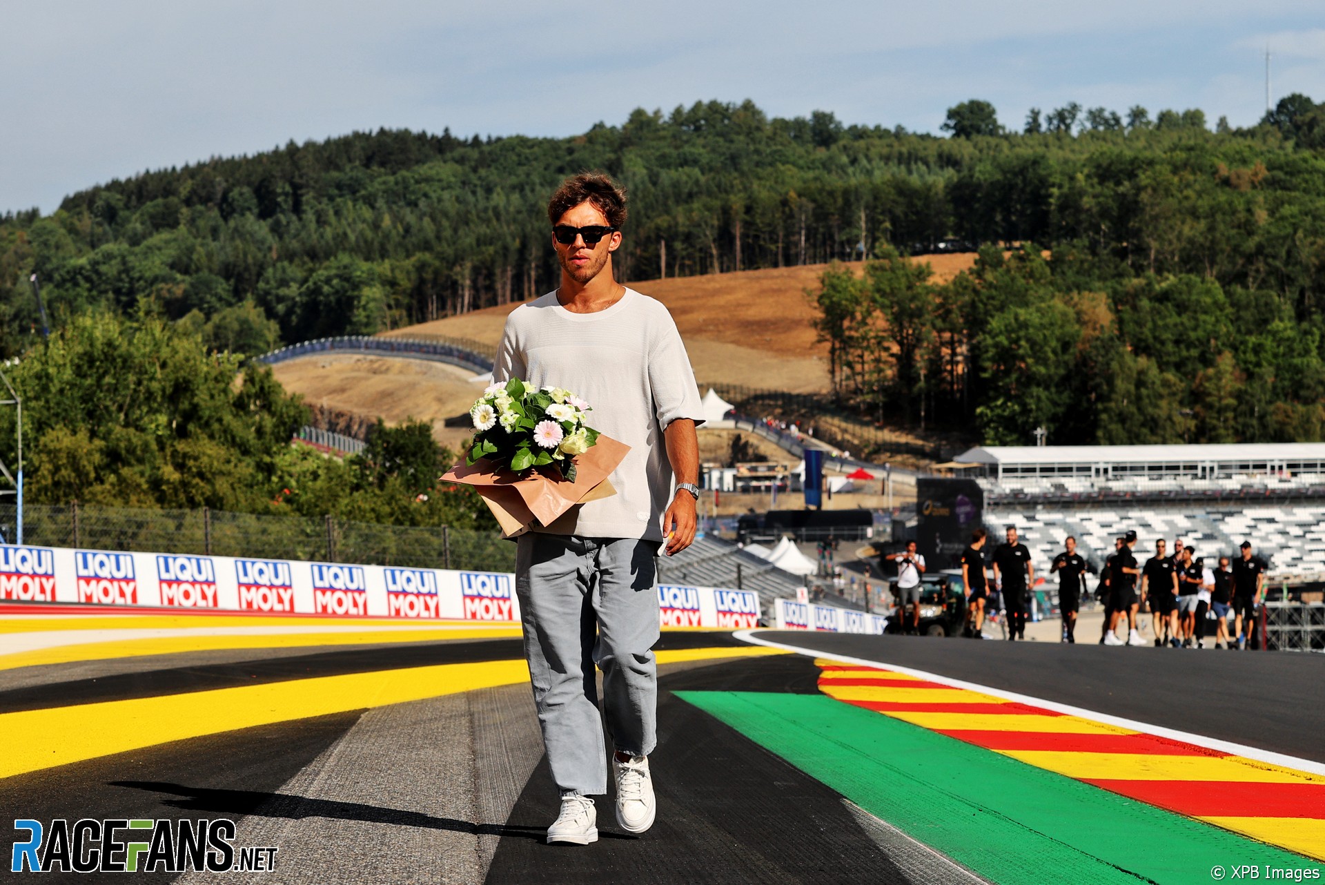 Pierre Gasly lays flowers at scene of Anthoine Hubert's fatal crash, Spa-Francorchamps, 2022