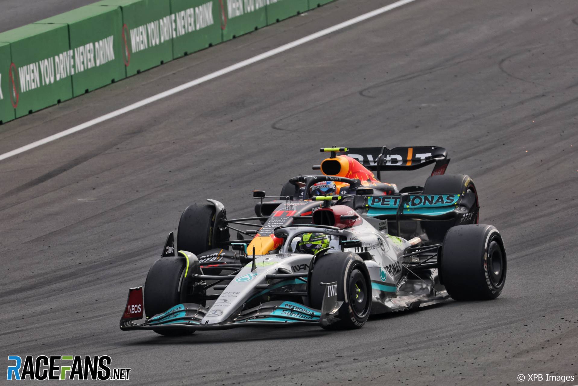 (L to R): Sergio Perez, Red Bull; Lewis Hamilton, Mercedes; Circuit Zandvoort, 2022