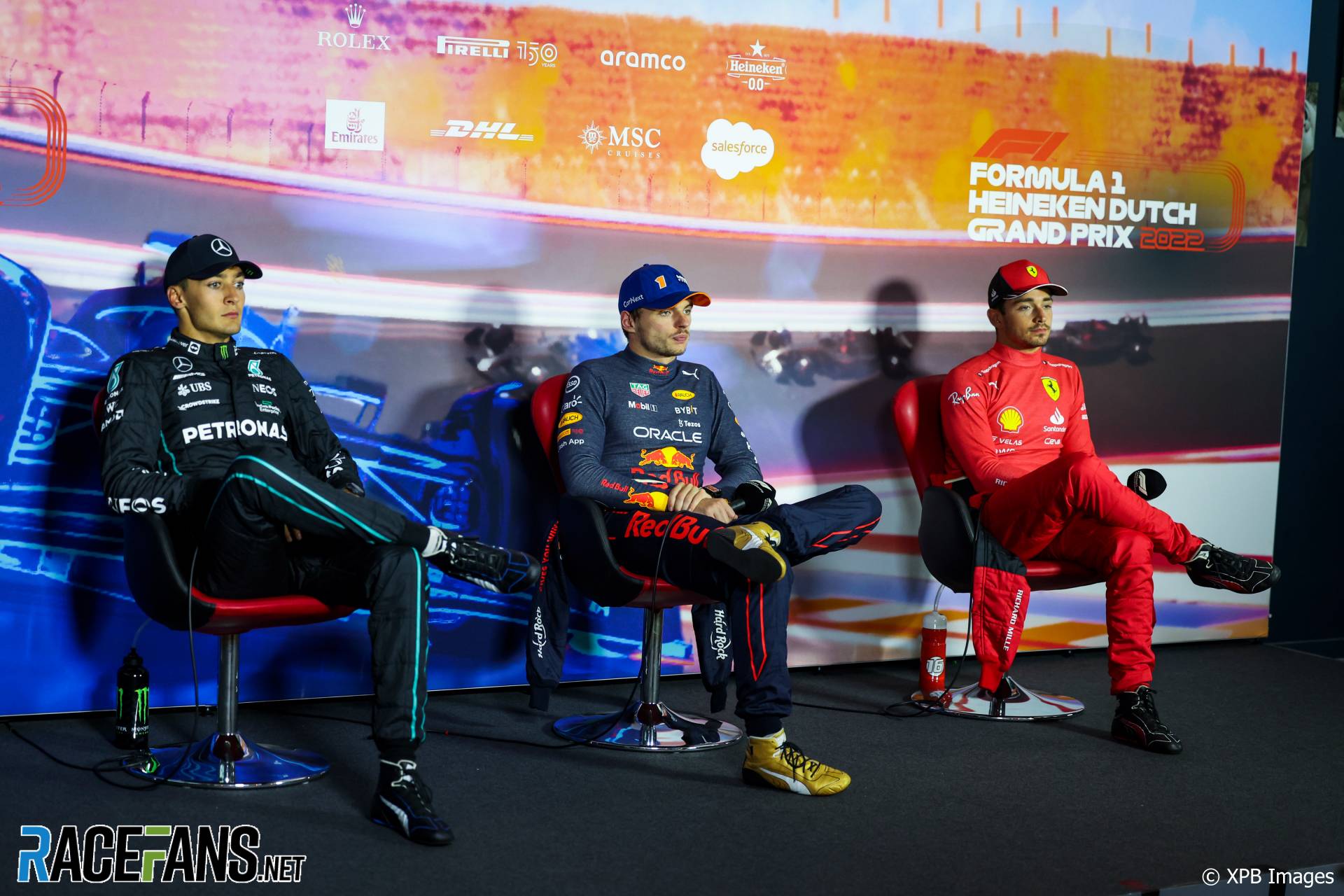 (L to R): George Russell, Mercedes; Max Verstappen, Red Bull; Charles Leclerc, Ferrari; Circuit Zandvoort, 2022