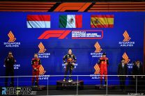 (L to R): Charles Leclerc, Ferrari; Sergio Perez, Red Bull; Carlos Sainz Jr, Ferrari; Singapore, 2022