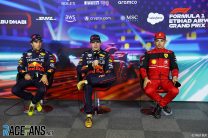 (L to R): Sergio Perez, Max Verstappen, Red Bull; Charles Leclerc, Ferrari, Yas Marina, 2022