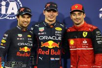 (L to R): Sergio Perez, Max Verstappen, Red Bull; Charles Leclerc, Ferrari, Yas Marina, 2022
