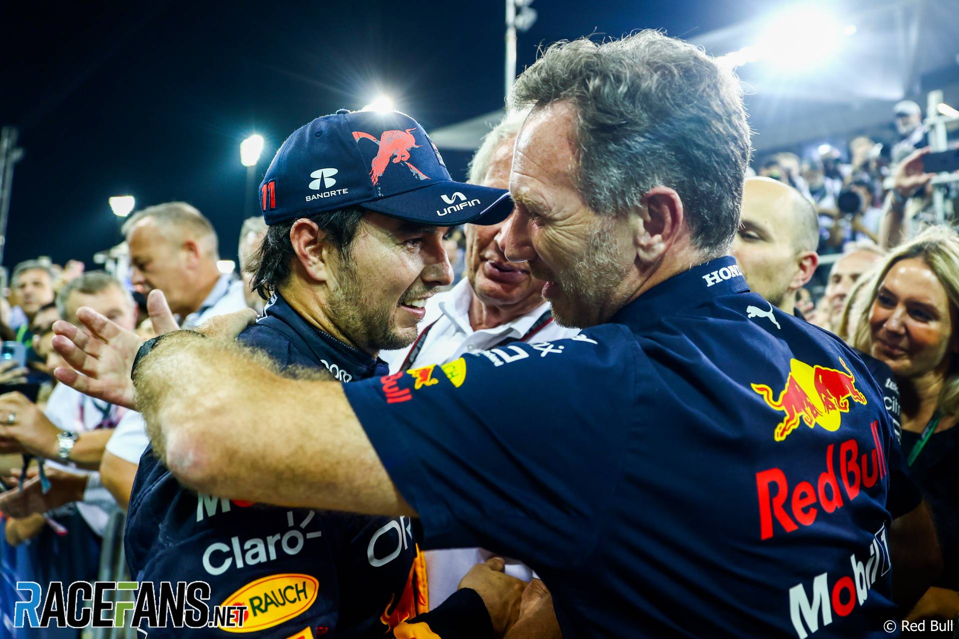 (L to R): Sergio Perez, Red Bull, Christian Horner, Red Bull Team Principal, Yas Marina, 2022