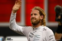 Sebastian Vettel, Aston Martin, waves to fans at the end of his final F1 race