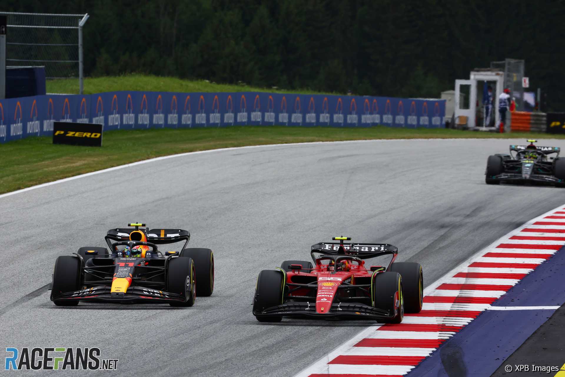 (L to R): Sergio Perez, Red Bull; Carlos Sainz Jr, Ferrari, Red Bull Ring, 2023