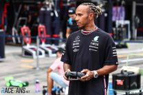 Lewis Hamilton and Esteban Ocon race remote control cars at Suzuka, 2023