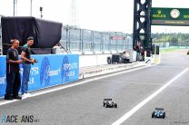 Lewis Hamilton and Esteban Ocon race remote control cars at Suzuka, 2023