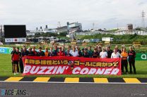 F1 drivers and team personnel at Buzzin' Corner, Suzuka, 2023