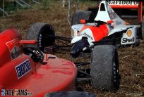 Senna clinches second world championship by taking Prost out