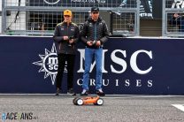 Esteban Ocon and Oscar Piastri drive remote-controlled cars, Suzuka, 2024